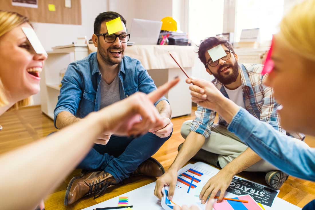 A hybrid team together for team building activities.