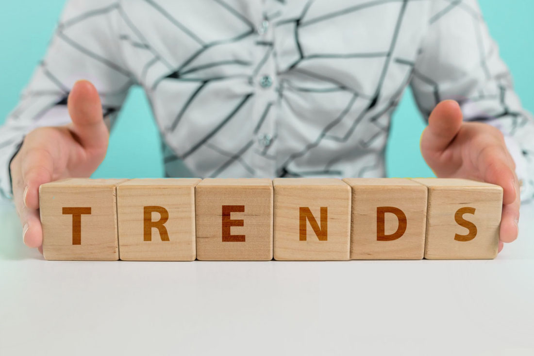 Wooden blocks on a table that spell “trends