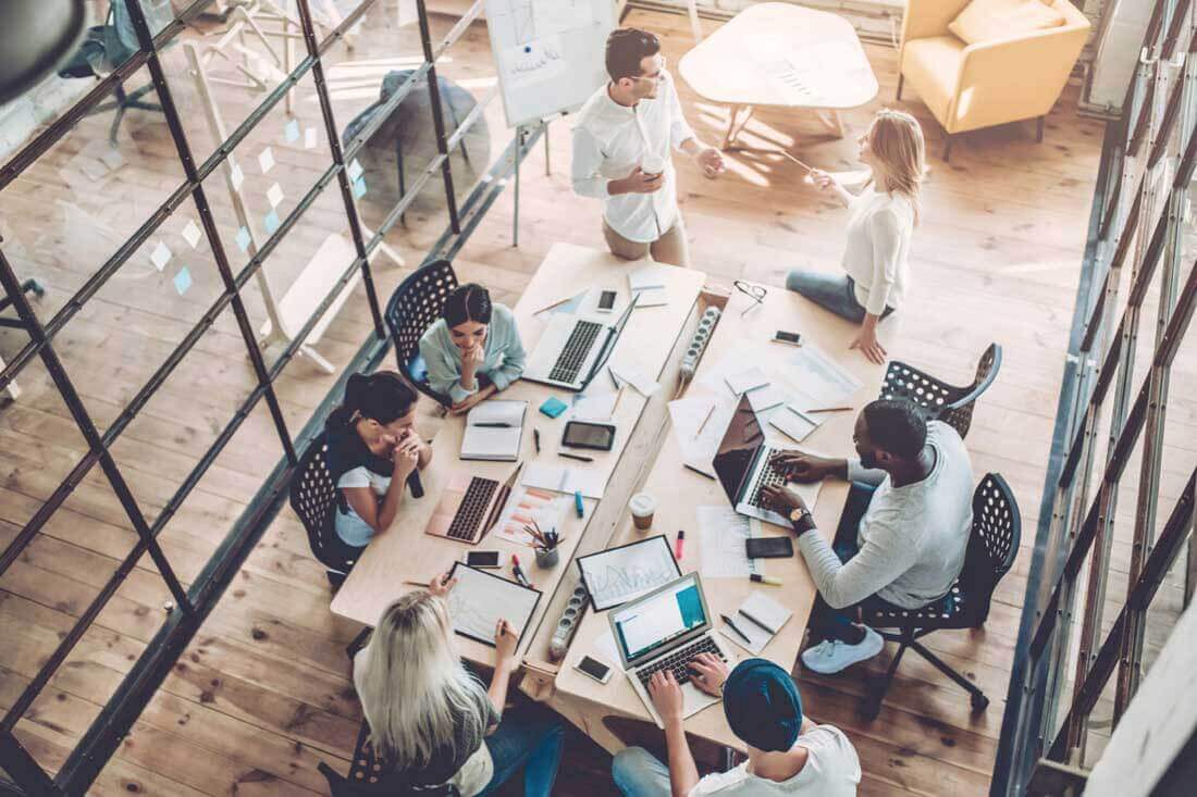 A team analyzing data from ActivTrak’s workplace productivity assessment tool.